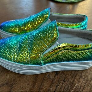 Shimmering Green and Gold Kids Sneakers.  Small tear in the “scales” on left